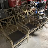 Vintage metal patio chairs refinished in the workshop